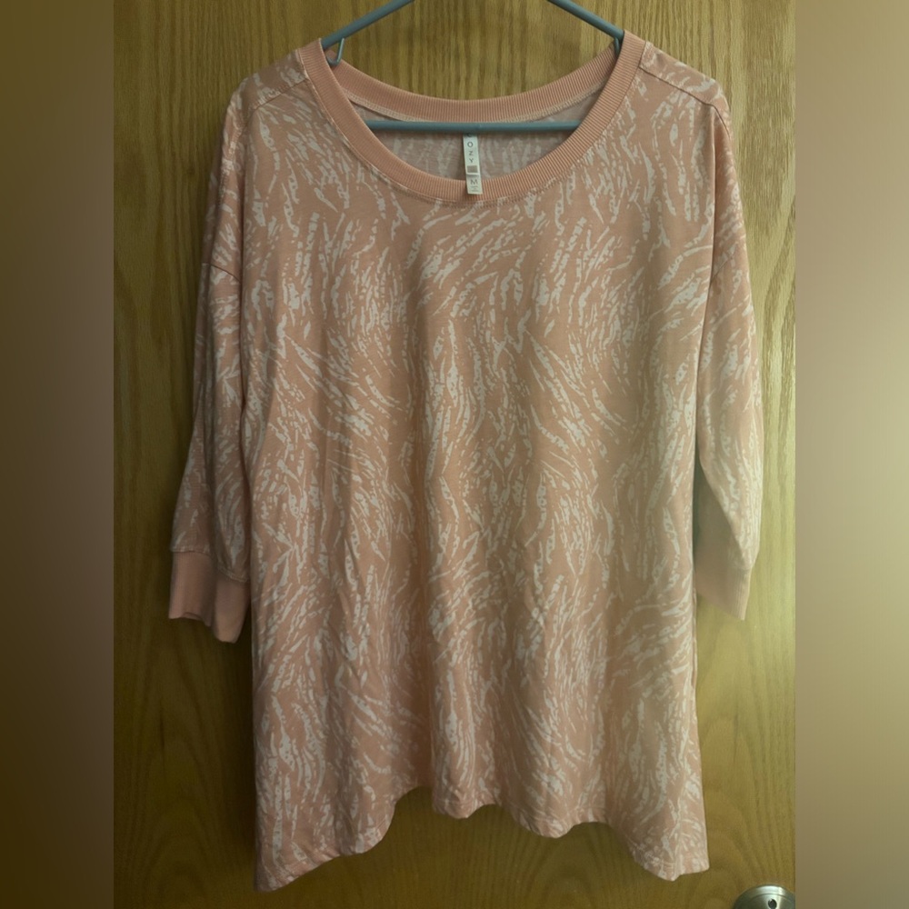 Pink colored with cream colored animal type print top. Size Medium LuLaRoe - Picture 4 of 4